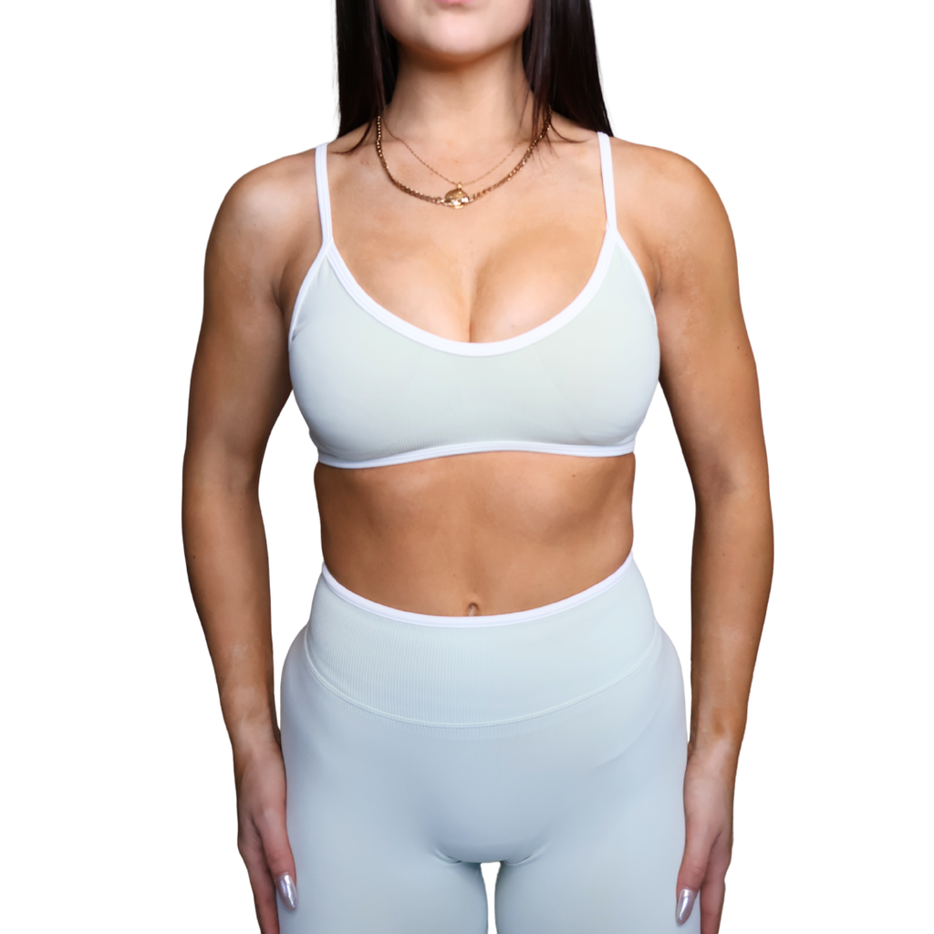 Womens sports bra with white detailing.