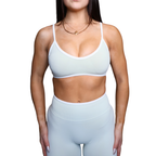 Womens sports bra with white detailing.