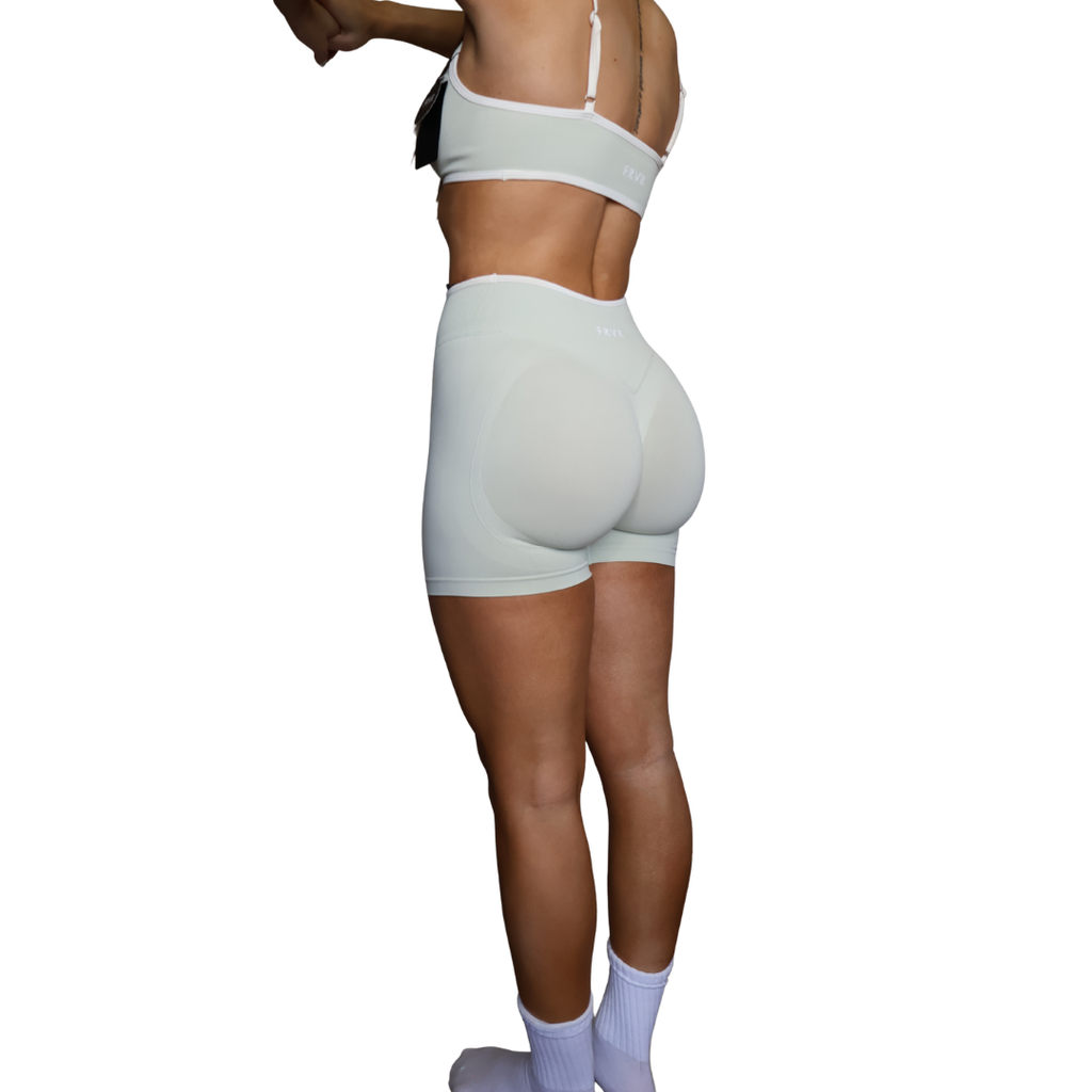 Pistachio green scrunch shorts with glute lifting design