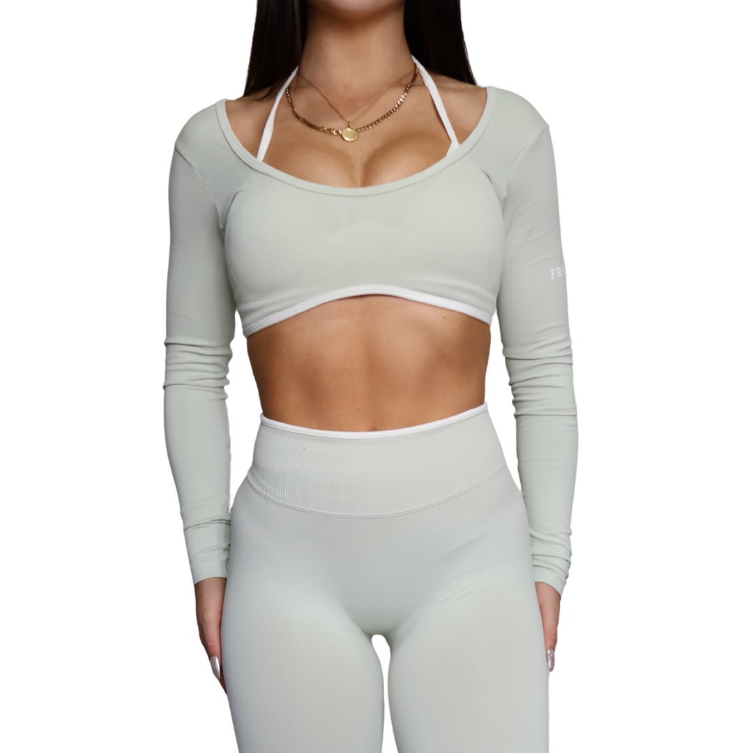 Woman wearing pistachio green activewear set