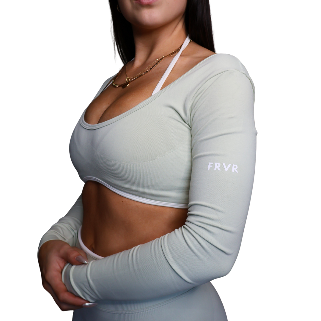 Long sleeve sports bra with FRVR logo. Womens activewear.