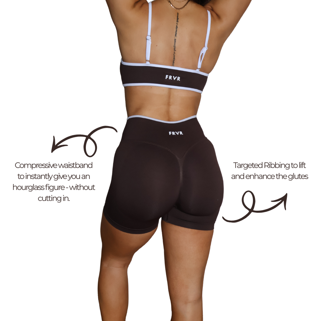 Womens brown seamless scrunch shorts with matching sports bra.