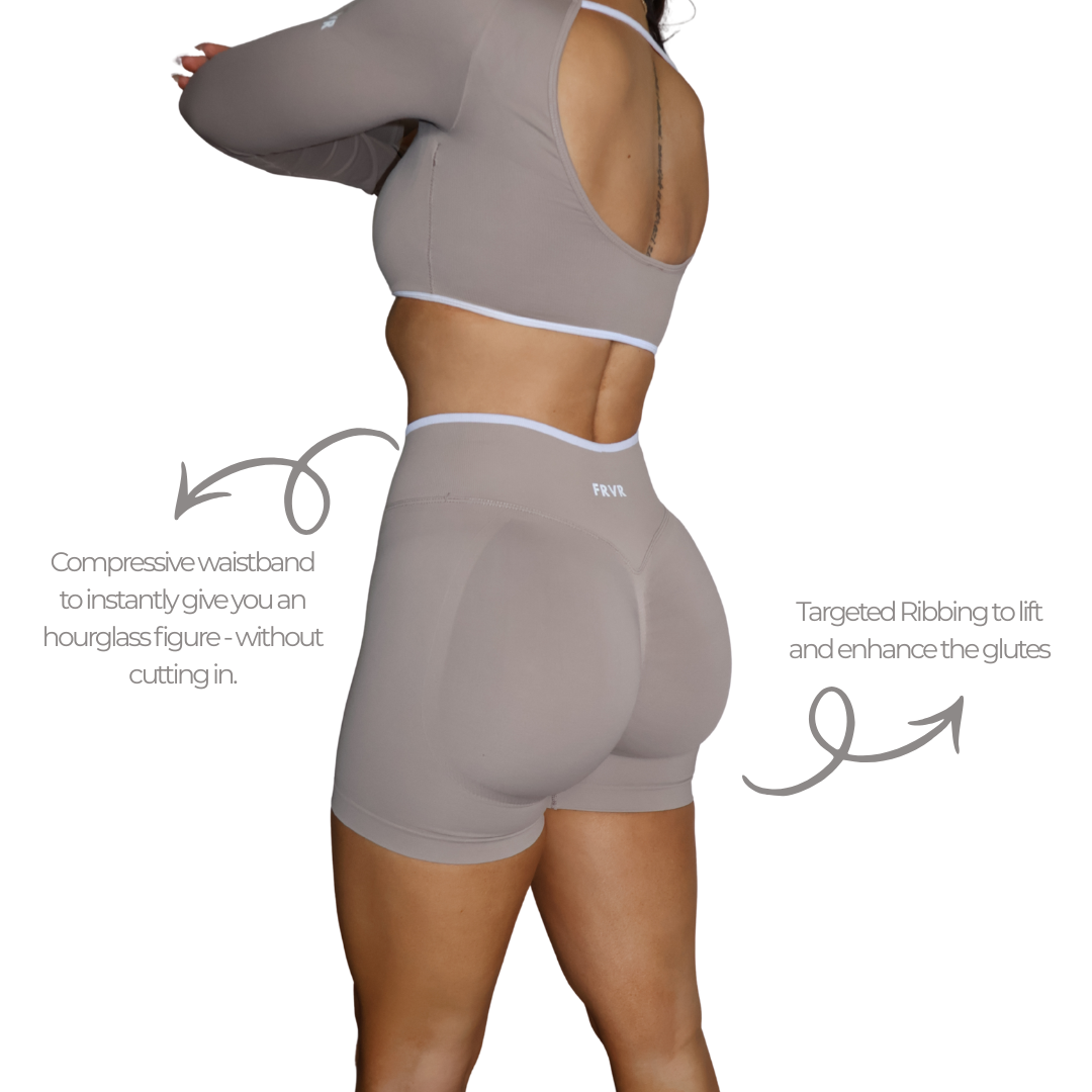 Womens beige seamless scrunch shorts. Glute lifting and a tummy control waistband.