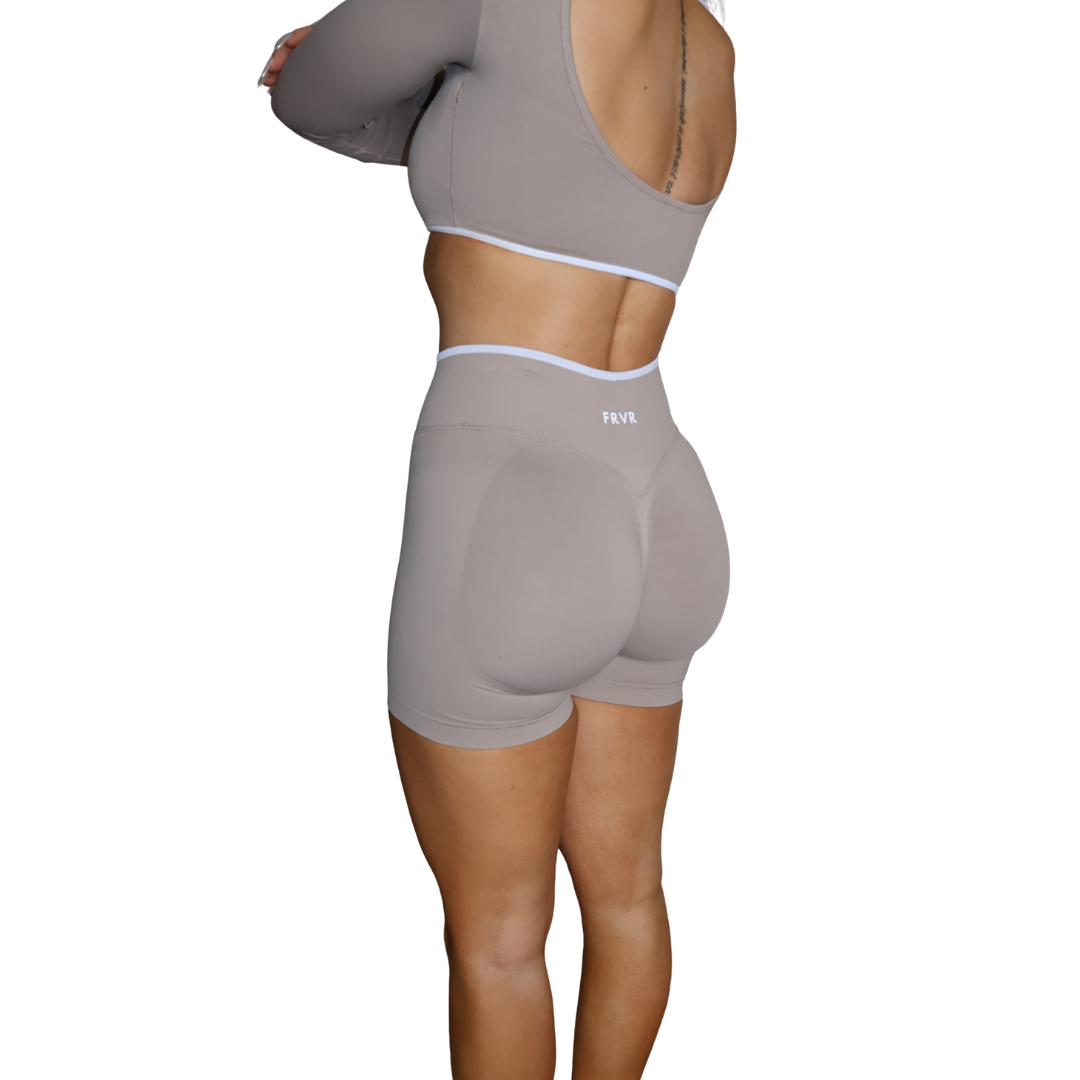 Beige seamless scrunch shorts. Glute lifting and flattering