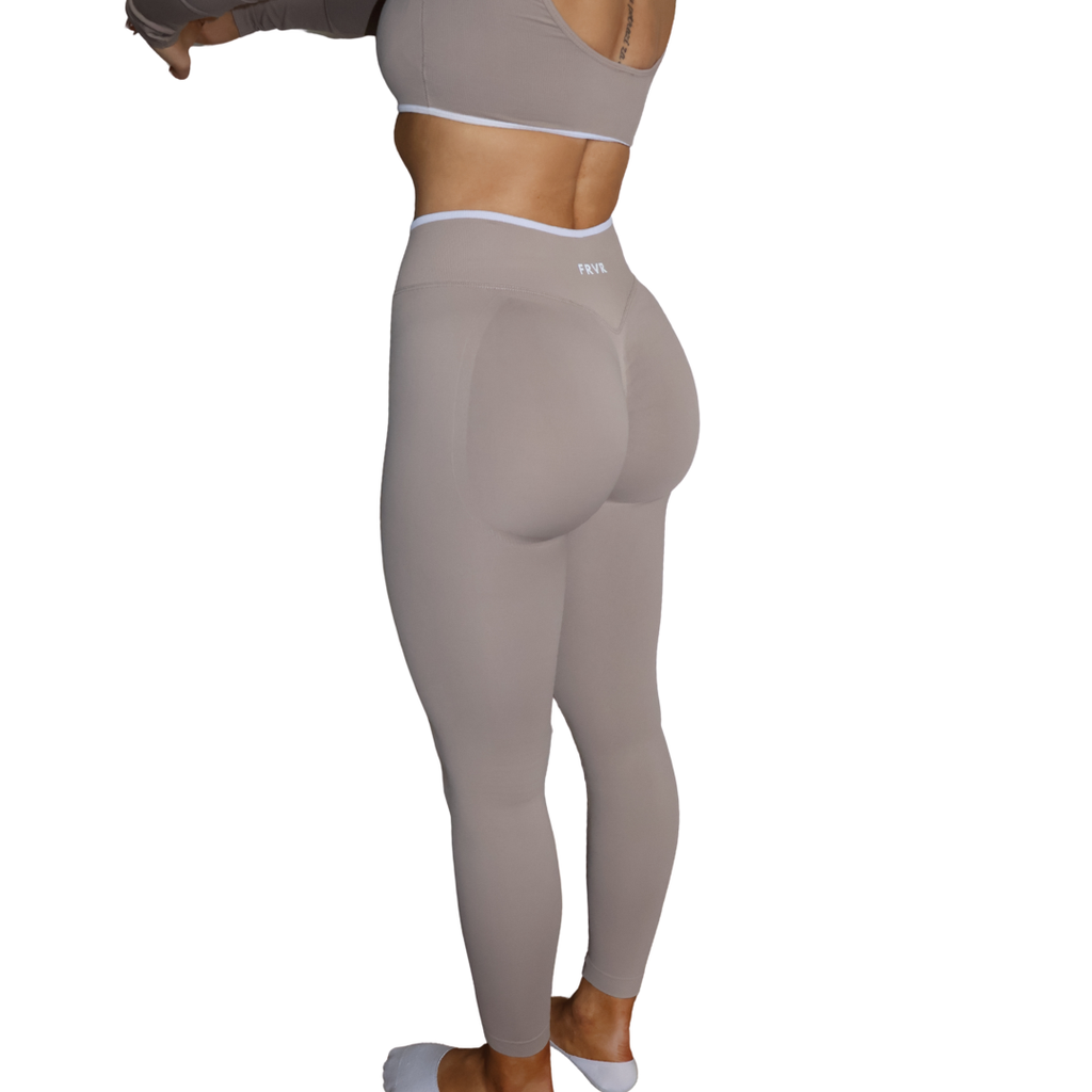 Beige seamless scrunch leggings for womens activewear.