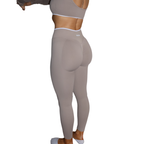 Beige seamless scrunch leggings for womens activewear.
